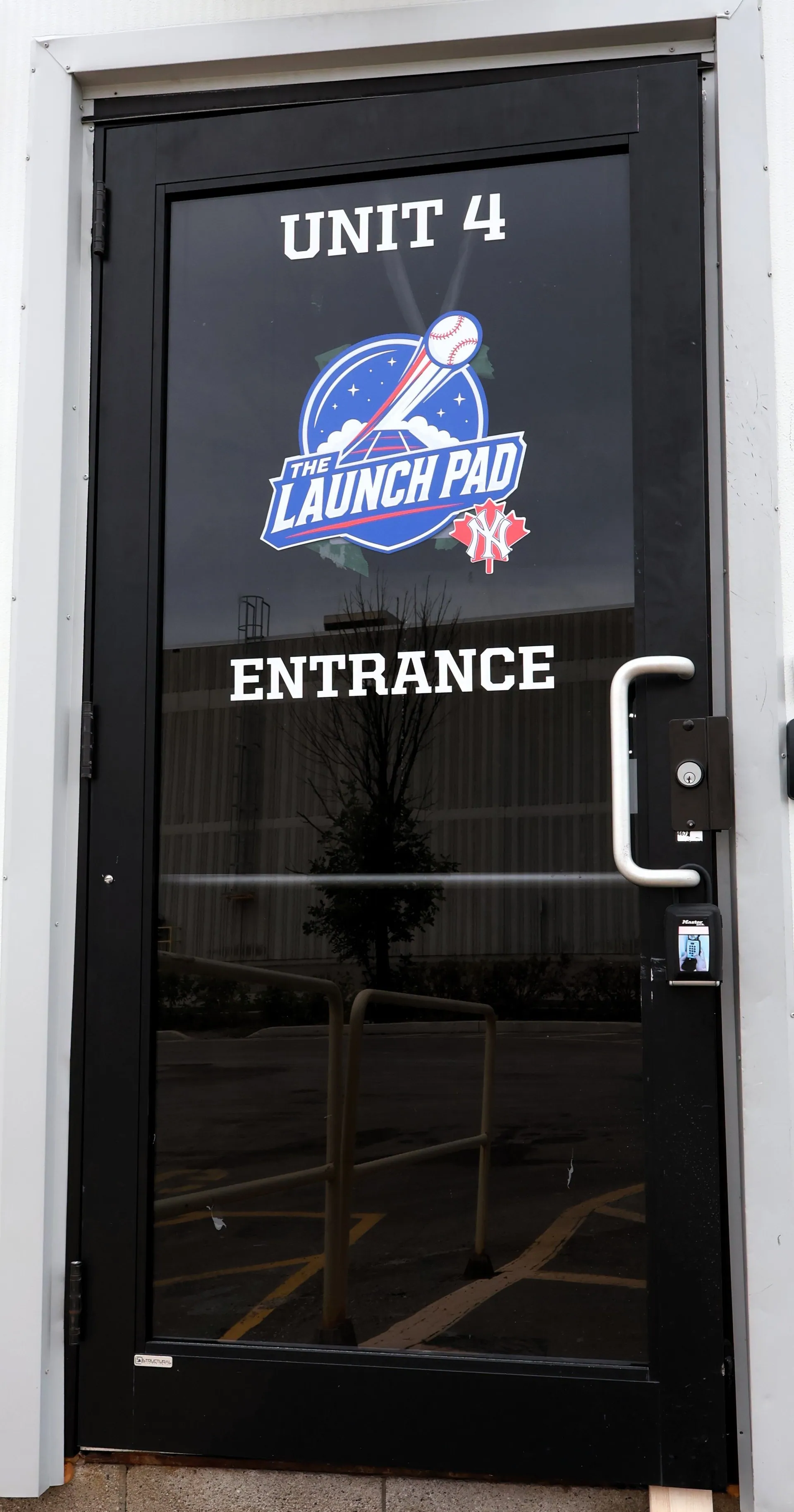 Pedestrian entrance marked Unit 4